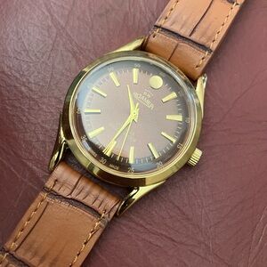 Vintage new old stock hand wind 1970s Vintage Gold and Brown Men's Watch